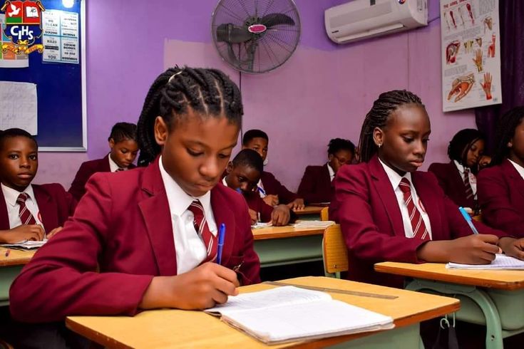 Students learning together at Omobola School